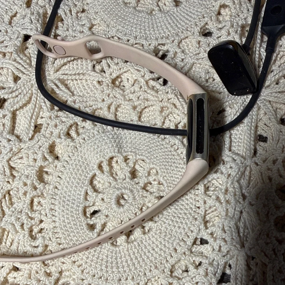 Elegant Fitbit Smartwatch (charge 5) with pink Band